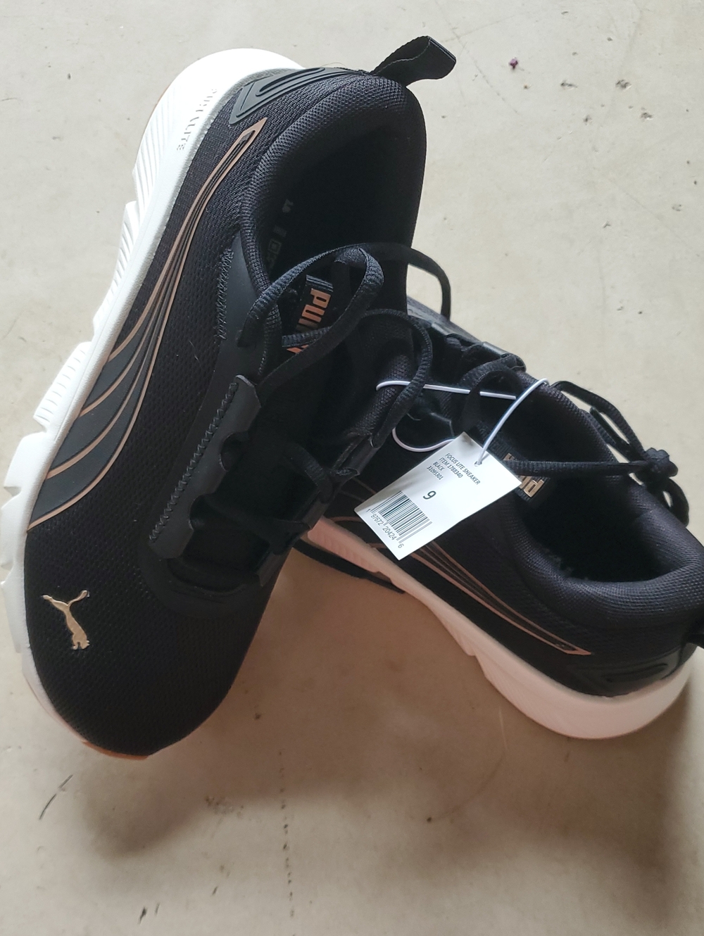 Puma Black Sneakers with Rose Gold Accents Women's 9